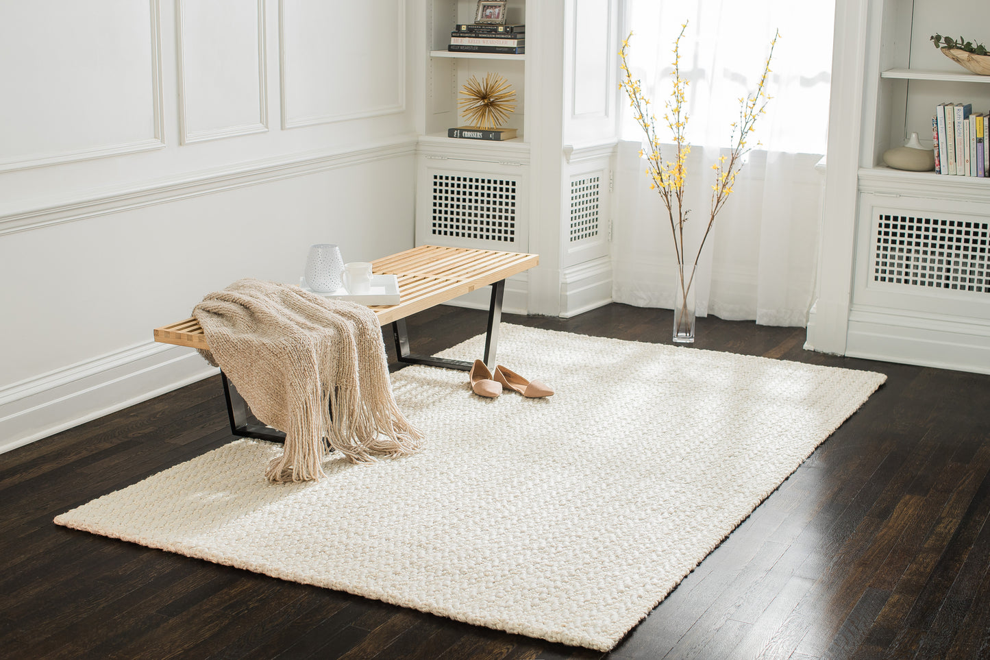 Freya Creamy Off-White Jute Rug in seating area