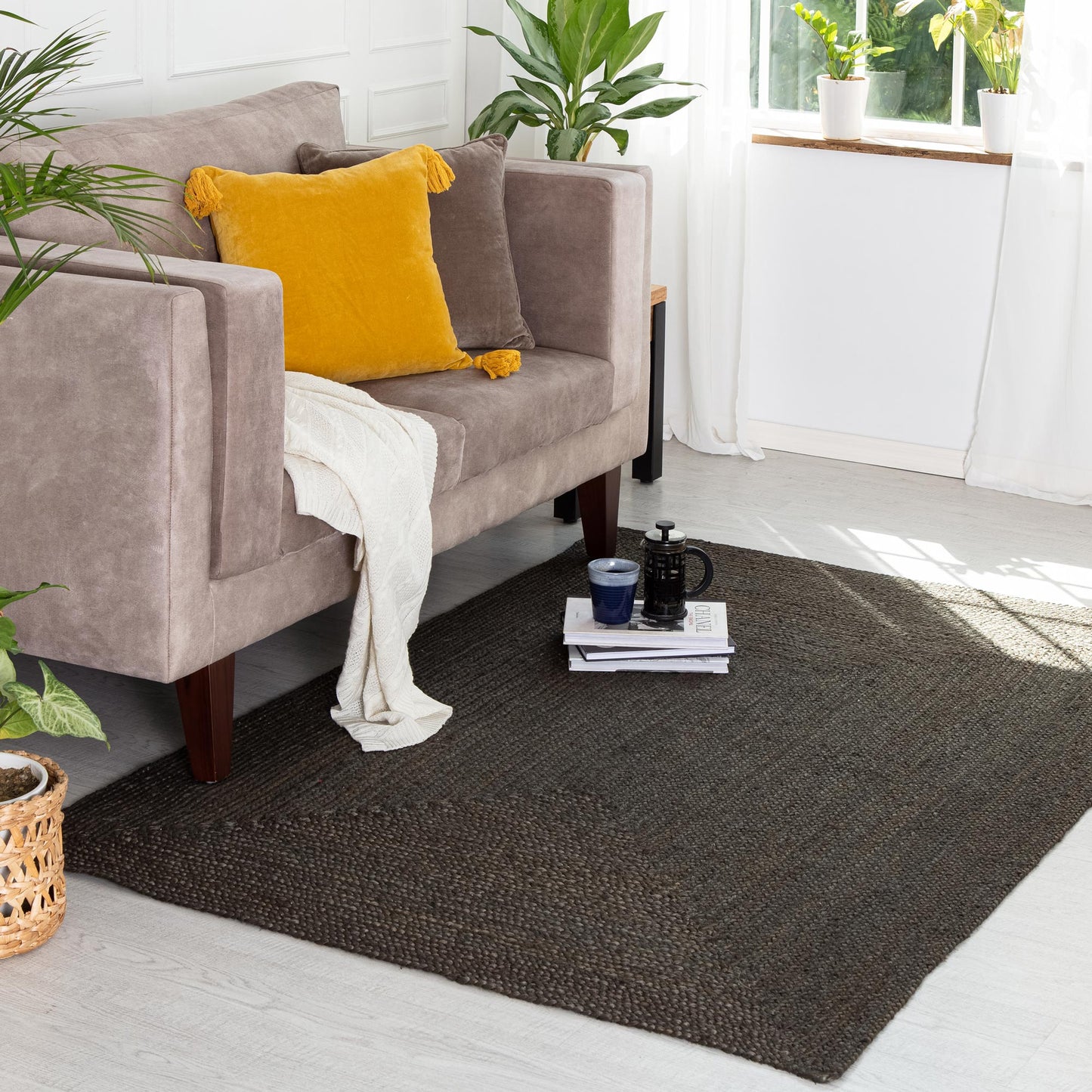 Gray Jute Rug in front of velvet couch