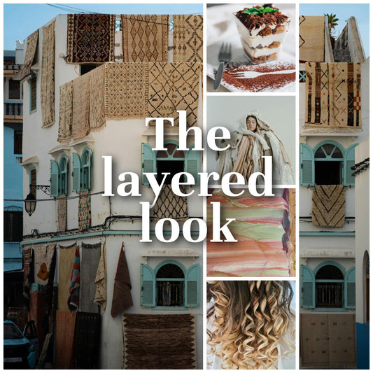 a collage titled The Layered Look with images of layered rugs, desserts, hair and clothing