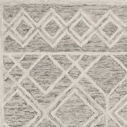 Textured wool area rug with geometric pattern in gray and beige