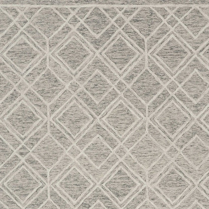 texture close up of gray and ivory wool rug with diamond pattern