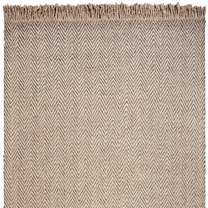 Textured woven wool rug with a herringbone pattern on a white background
