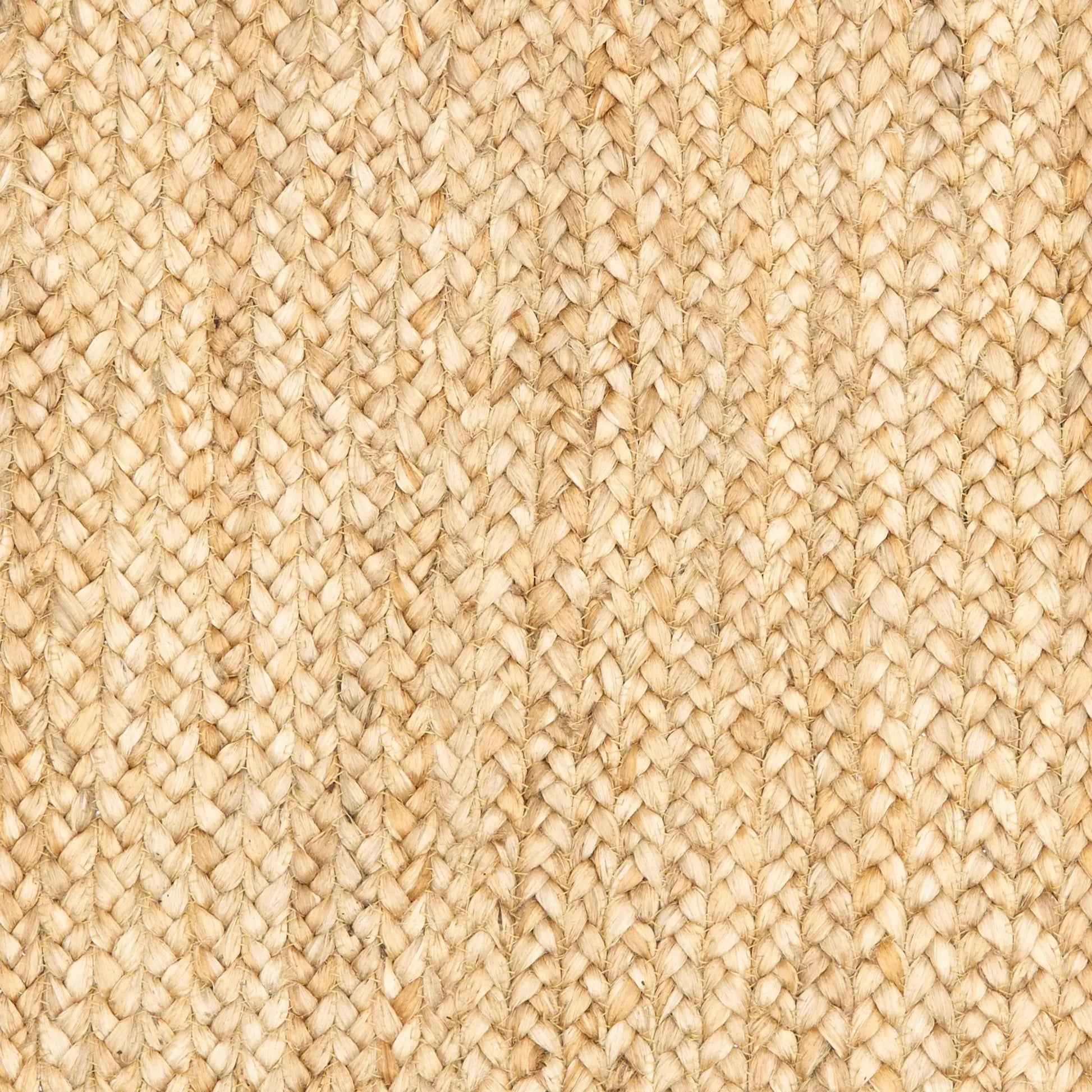 close-up of classic tan bordered jute rug