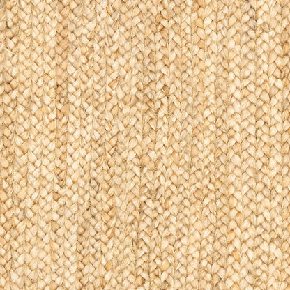 close-up of classic tan bordered jute rug