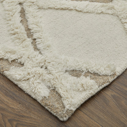 Close-up of a textured beige rug on a wooden floor