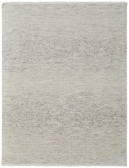 textured gray wool rug on white background