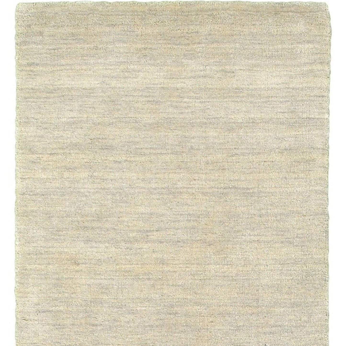 Beige area rug with a textured pattern