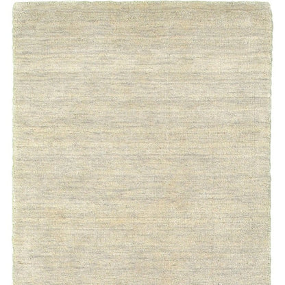 Beige area rug with a textured pattern