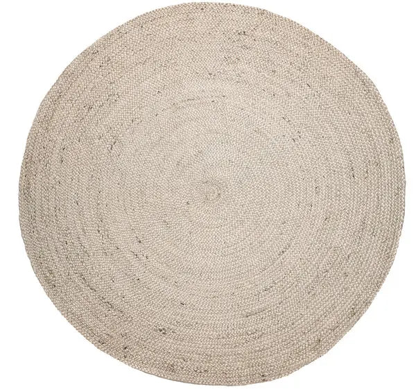 Round ivory  jute rug on a white background