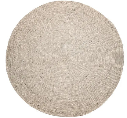 Round ivory  jute rug on a white background
