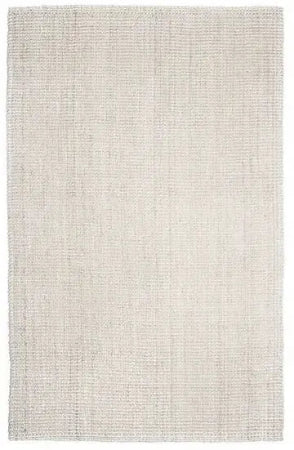 Textured ivory rug on a white background