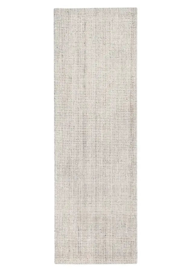 ivory jute runner rug with a textured pattern on a white background