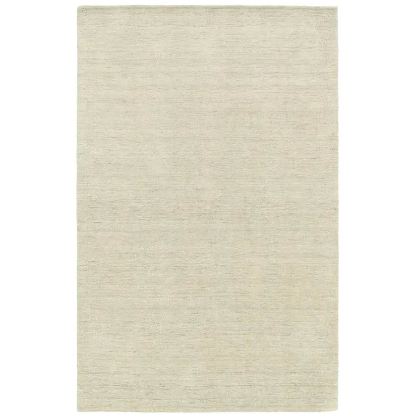 Beige wool area rug on a white background
