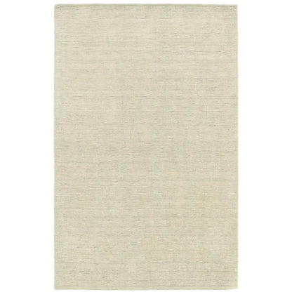 Beige wool area rug on a white background