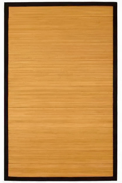 Rectangular bamboo area rug with a dark border