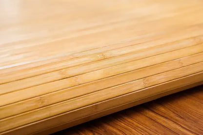 Close-up of a bamboo mat on a wooden floor