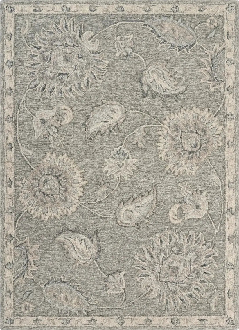 Floral patterned rwool ug with a gray background