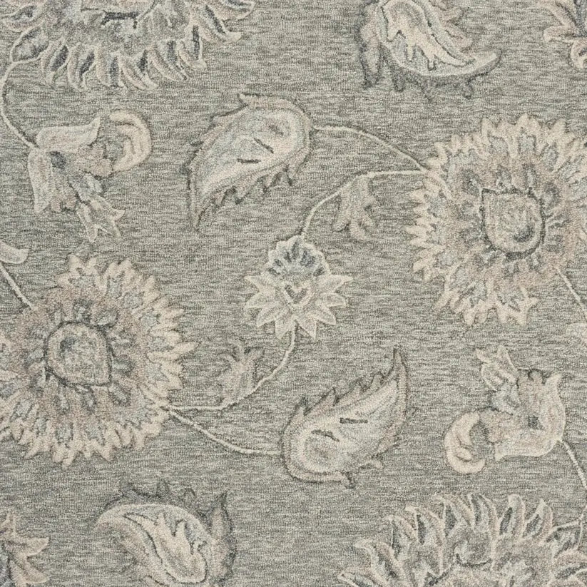 wool rug with floral and paisley patterns in neutral tones