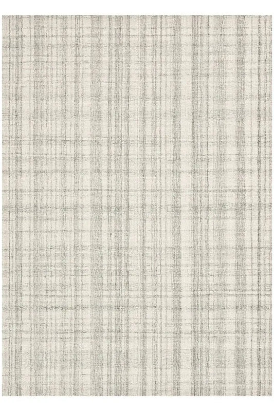 A square area rug with a distressed, textured plaid pattern in cream and light gray.
