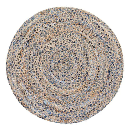 Round woven jute rug with a multicolor pattern on a white background