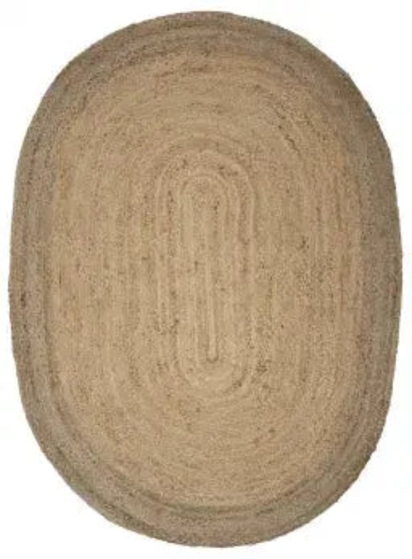 Beige braided rug on a plain background