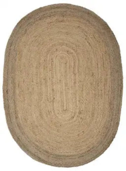 Beige braided rug on a plain background