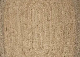 Beige braided rug with a circular pattern