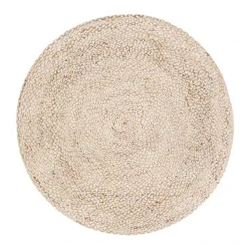 Round beige jute rug on a white background