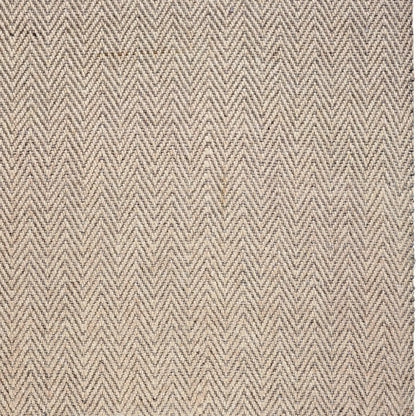 texture close up of herringbone oatmeal rug