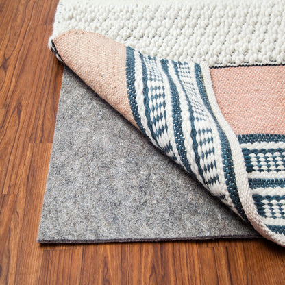 All-Surface Rug Pad felt side up under a jute rug