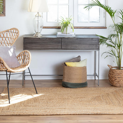 Kerala Natural Jute Rug  with wicker chair and credenza