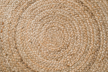 close-up of braided weave of round jute rug