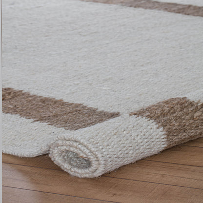 Whippoorwill Handloom Woven Jute Area Rug  rolled