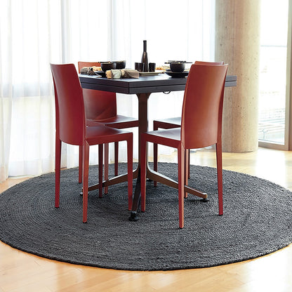 8' x 8' Round Kerala Dark Gray Jute Rug under small dining set